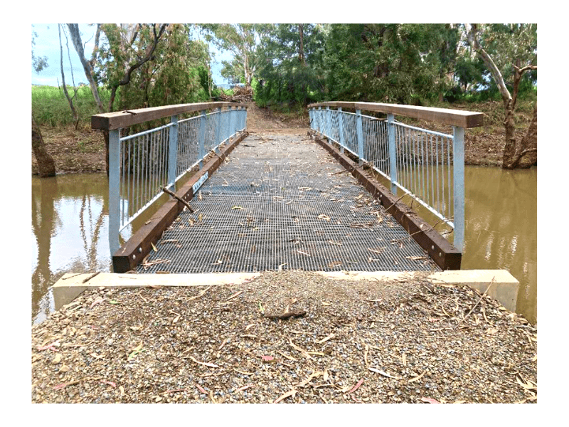 ?Flowerdale lagoon Timber Foot Bridge designed by Wood Research and Development and constructed and installed by Timber Restoration Services.