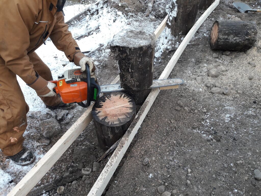 Timber restoration work underway on a deteriorated pedestrian bridge