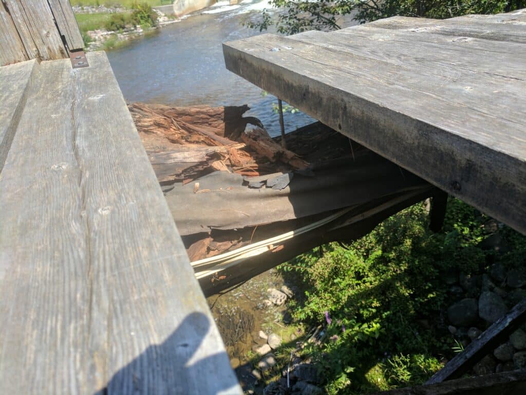 Rotting timber in the Heritage Walkway Bridge before restoration